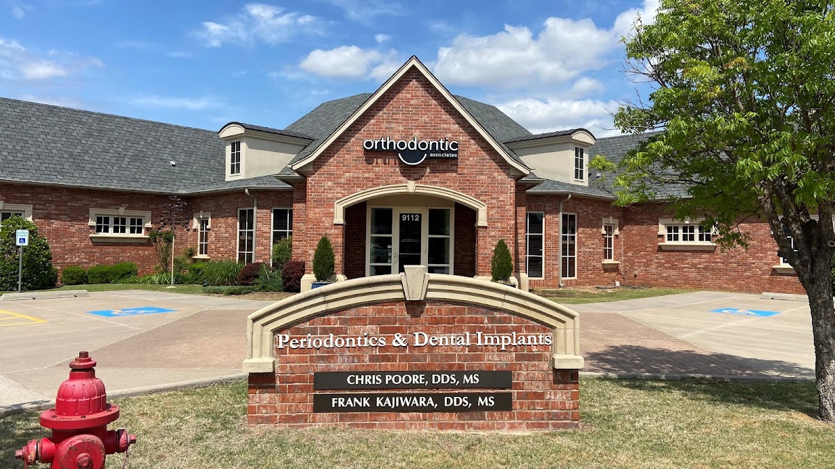 Oklahoma Center for Implants & Periodontics (ocip). Dr. Chris Poore & Dr. Frank Kajiwara photo 1